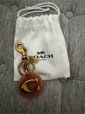 NWT, Coach vintage pink “C”  on pink key chain /bag charm.